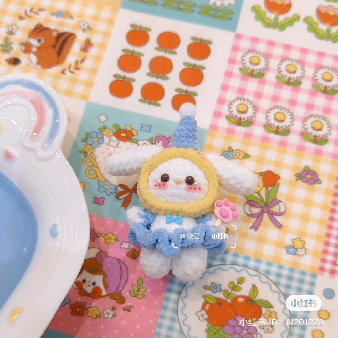 Adorable Crochet Cupcake Dolls with Purple and White Decorations