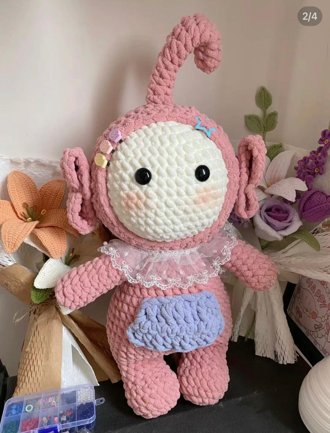 Adorable Pink Crochet Toy with Cute Accessories and Details