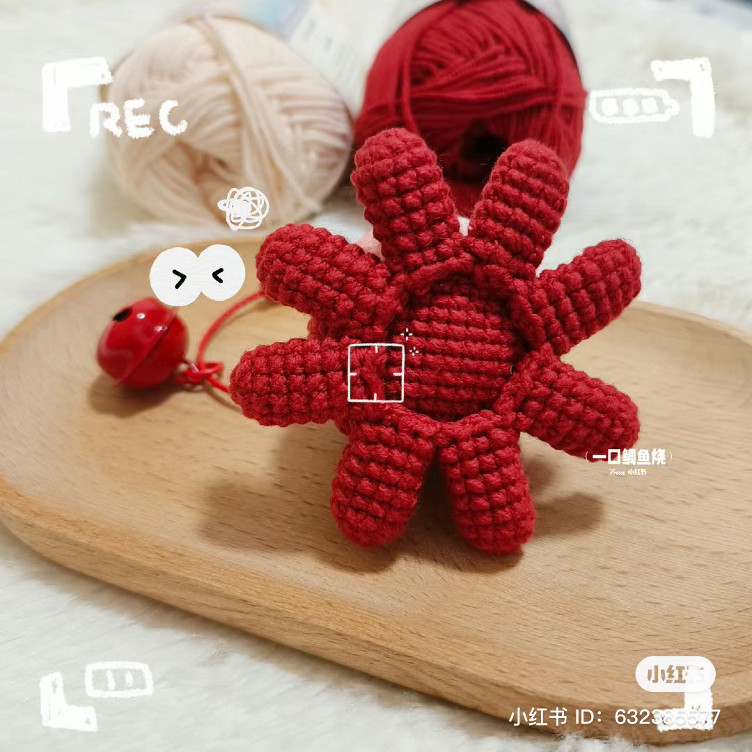 Bạch tuộc len đỏ dễ thương với biểu cảm đáng yêu