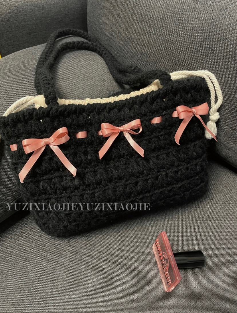Chic Black Crochet Bag with Pink Ribbon Accents