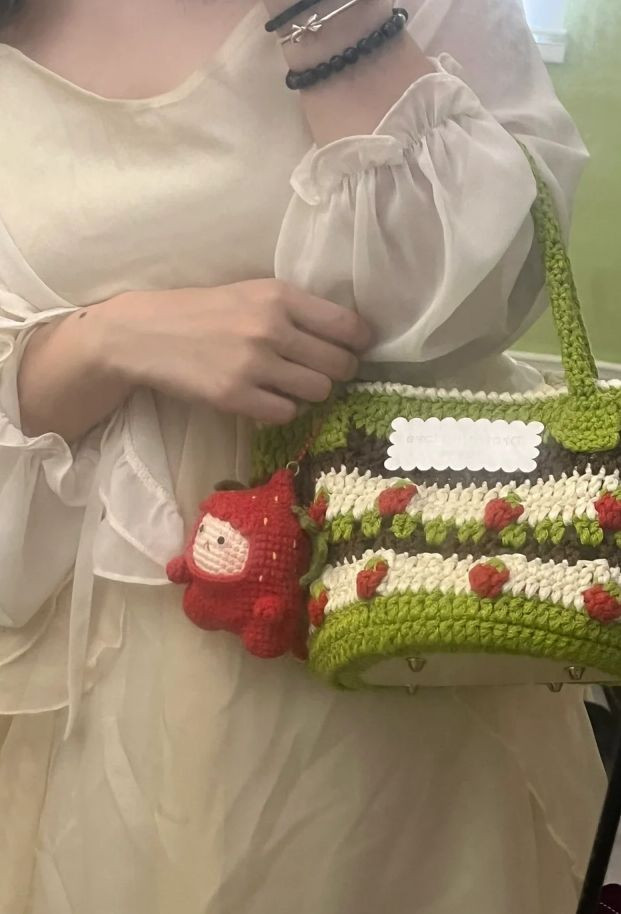 Colorful Crochet Bag with Strawberry Patterns and Green Handles
