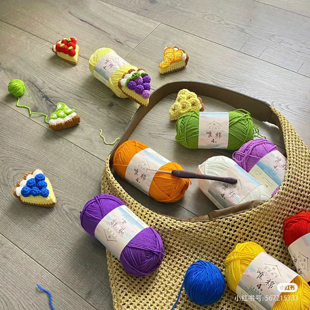 Colorful Crochet Cake Slices with Yarn Balls and Hook