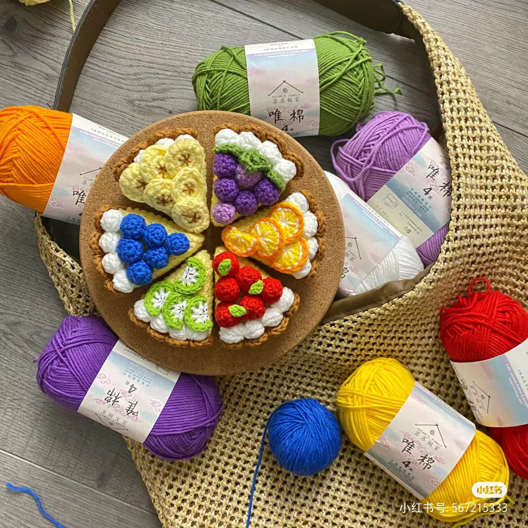 Colorful Crochet Cake Slices with Yarn Balls and Hook