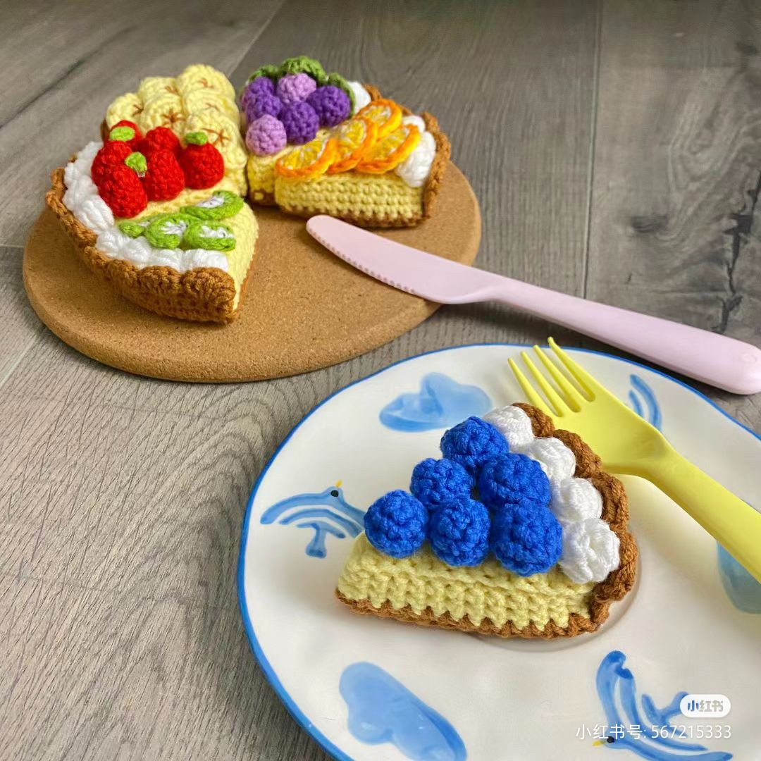 Colorful Crochet Cake Slices with Yarn Balls and Hook