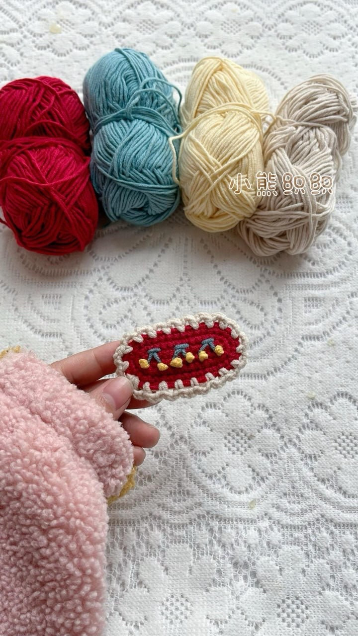 Colorful Crochet Patch with Red, Blue, and Yellow Accent