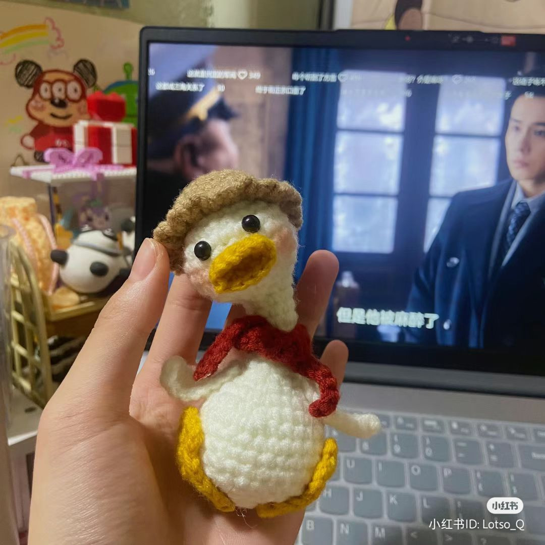 Crochet Duck Pattern with Cozy Scarf on Keyboard