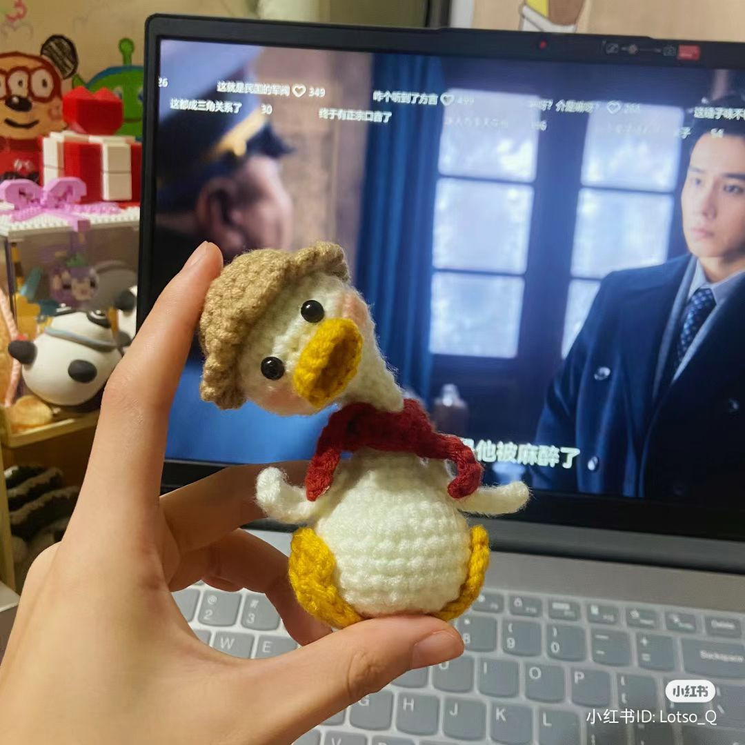 Crochet Duck Pattern with Cozy Scarf on Keyboard