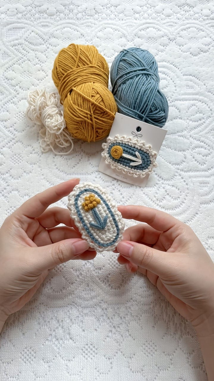 Crochet Flower Brooches with Yellow and Blue Yarn Patterns