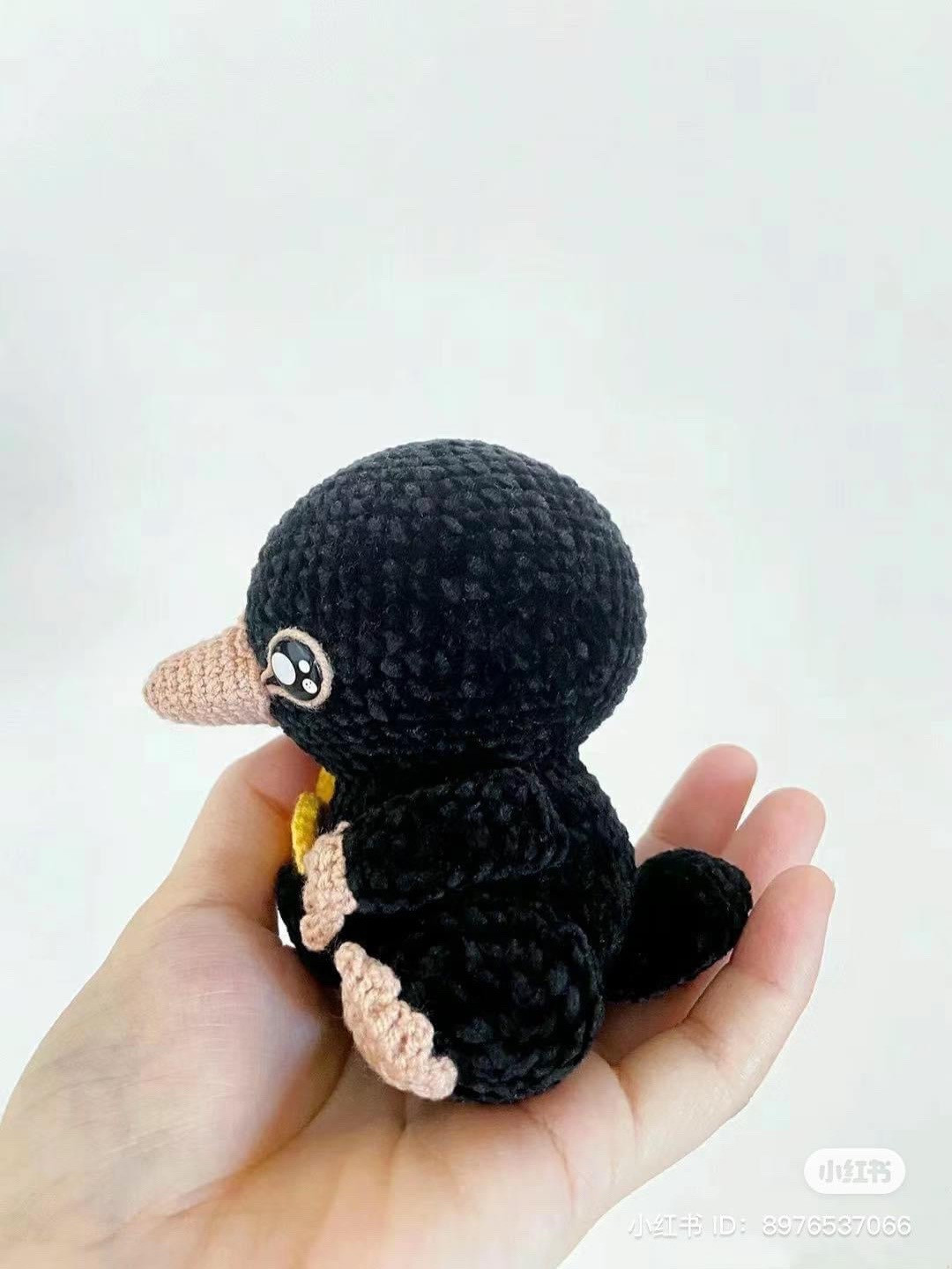 Crochet Pattern for Adorable Black Creature Holding Coins