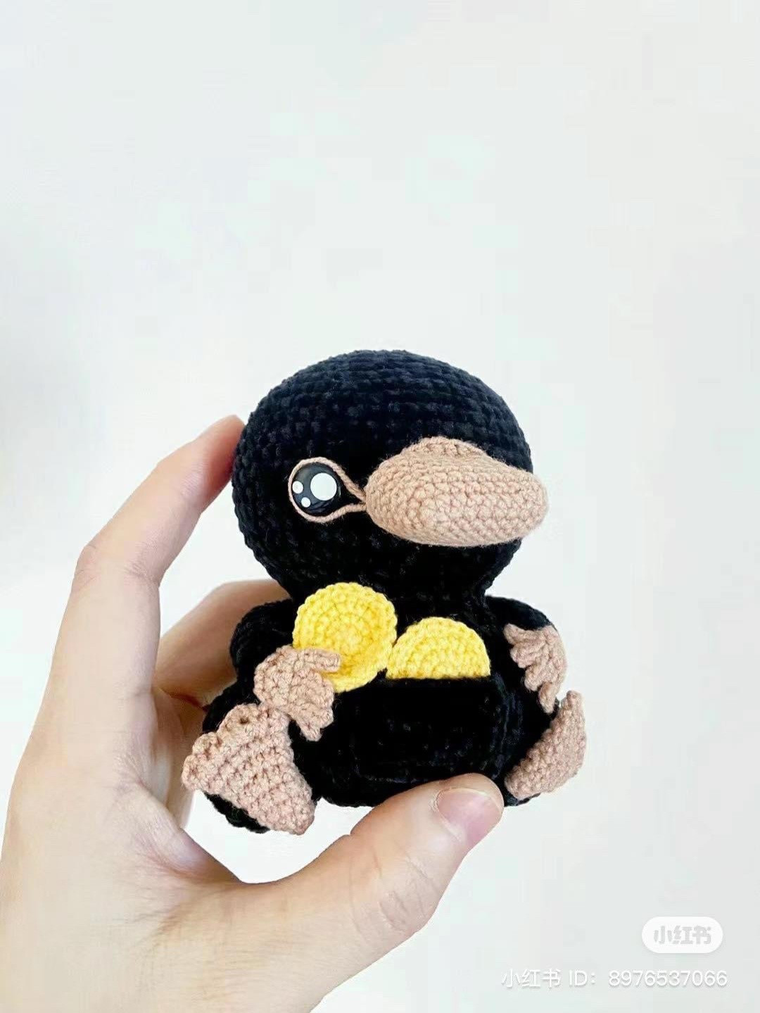 Crochet Pattern for Adorable Black Creature Holding Coins