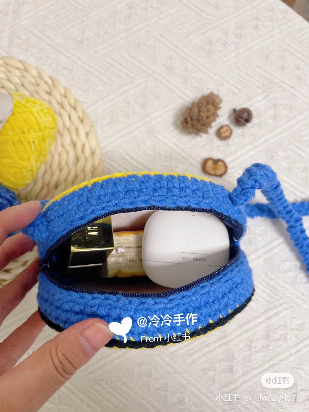 Crochet Smiley Face Bag with Blue Strap and Yellow Yarn