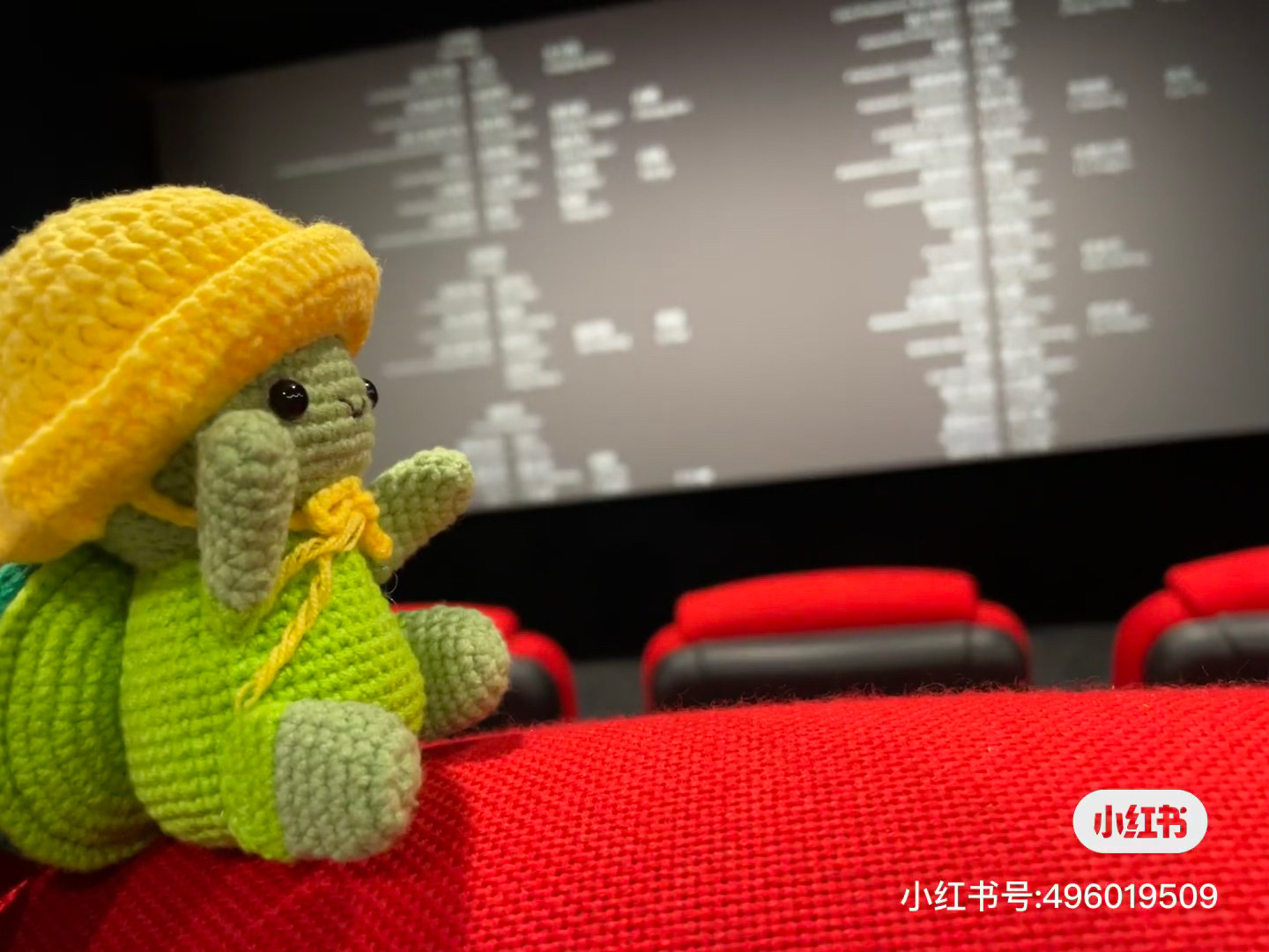 Crochet Turtle Enjoying a Scenic Train Ride with Yellow Hat