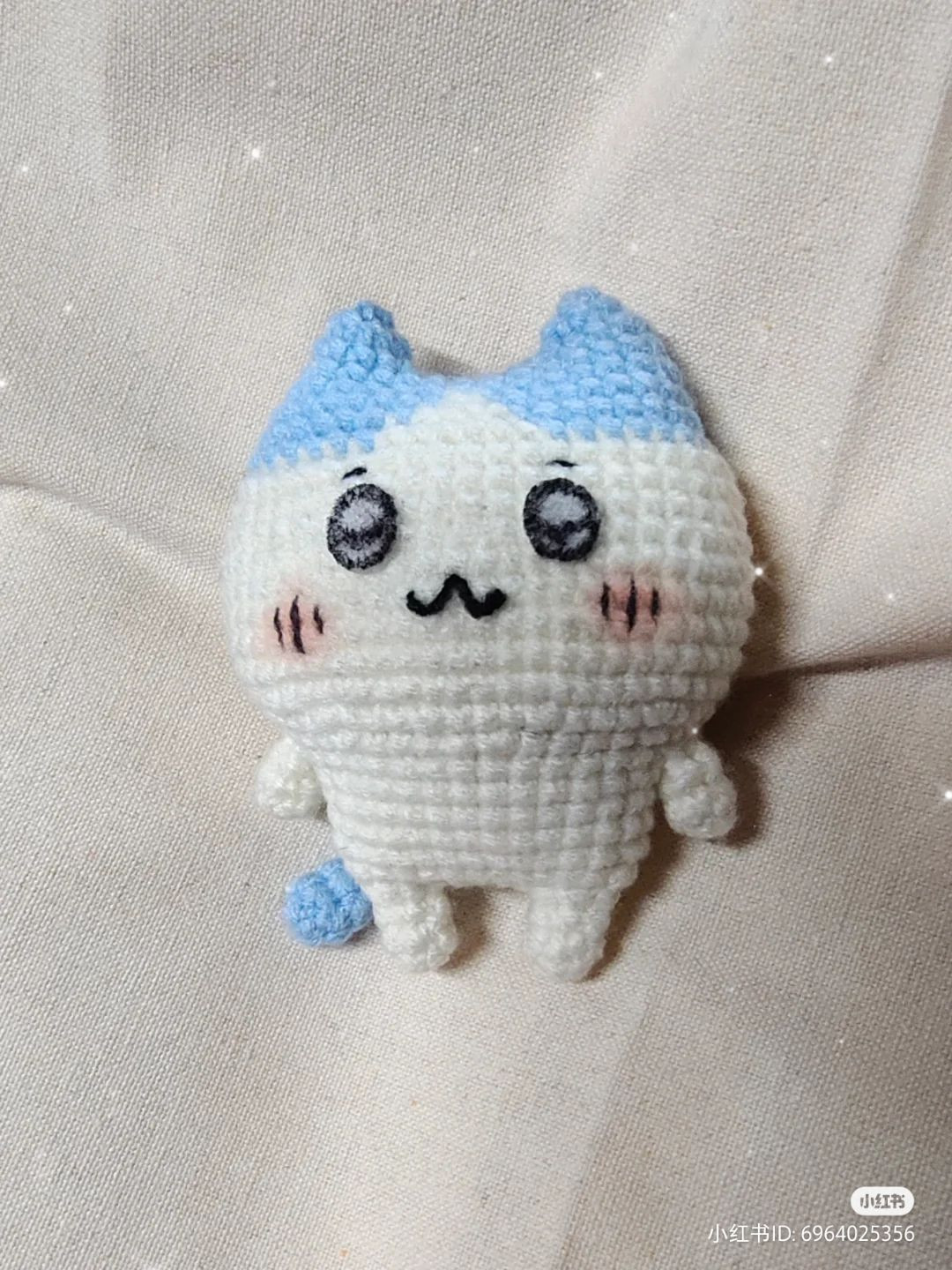 Cute Crochet Cat Pattern with Blue Ears and Blush Cheeks