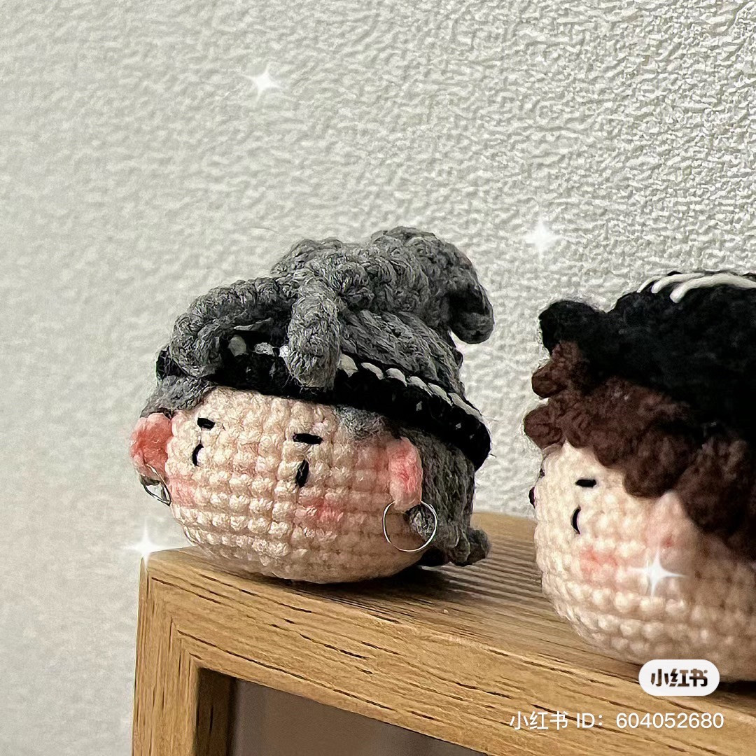 Cute Crochet Character with Gray Hair and Earrings