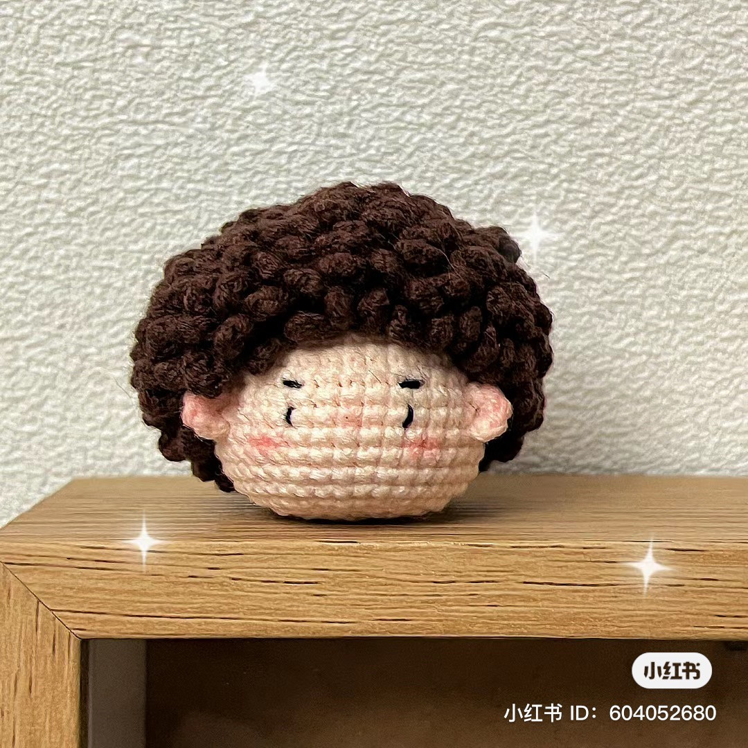 Cute Crochet Character with Gray Hair and Earrings