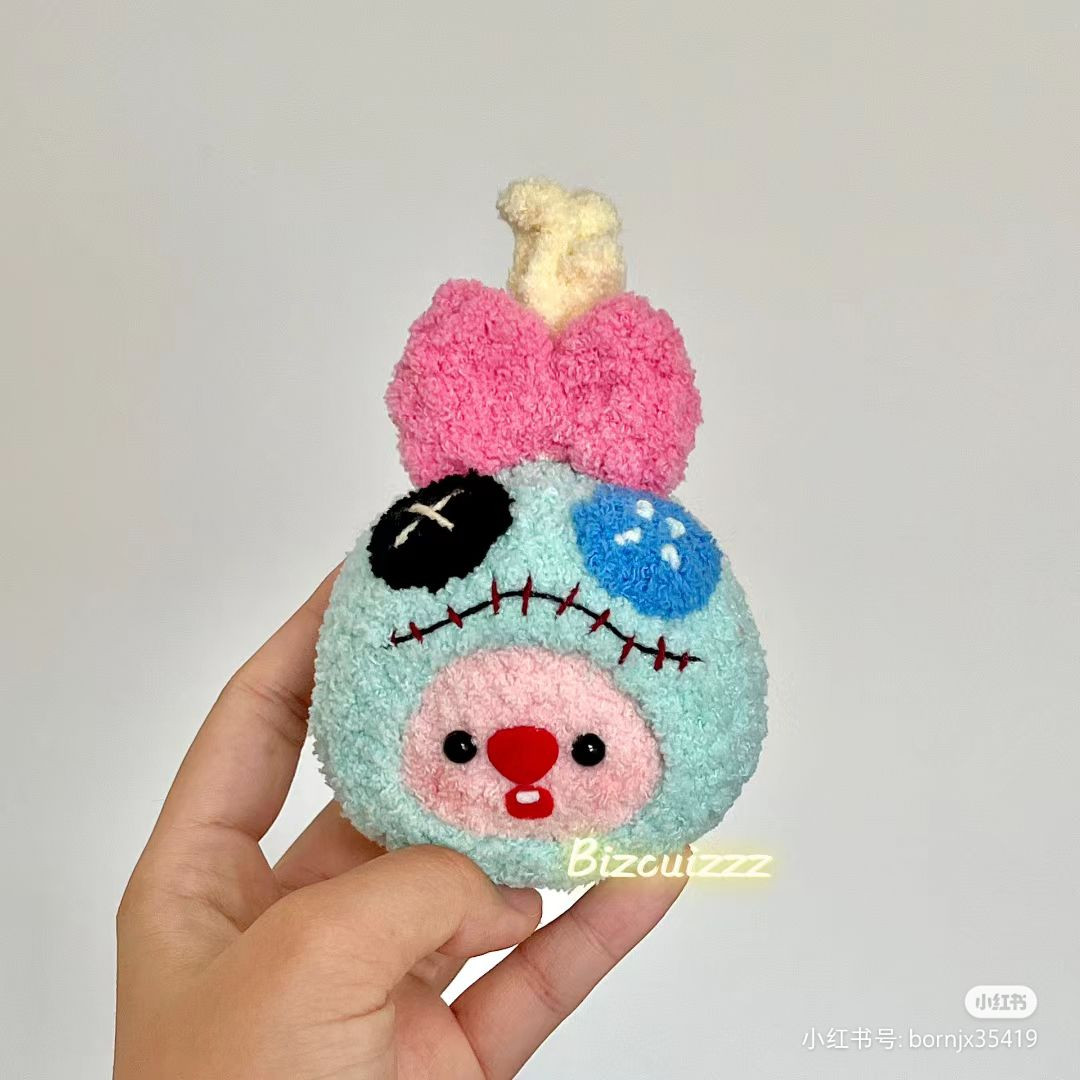 Cute Crochet Plushie with Colorful Bow and Button Details