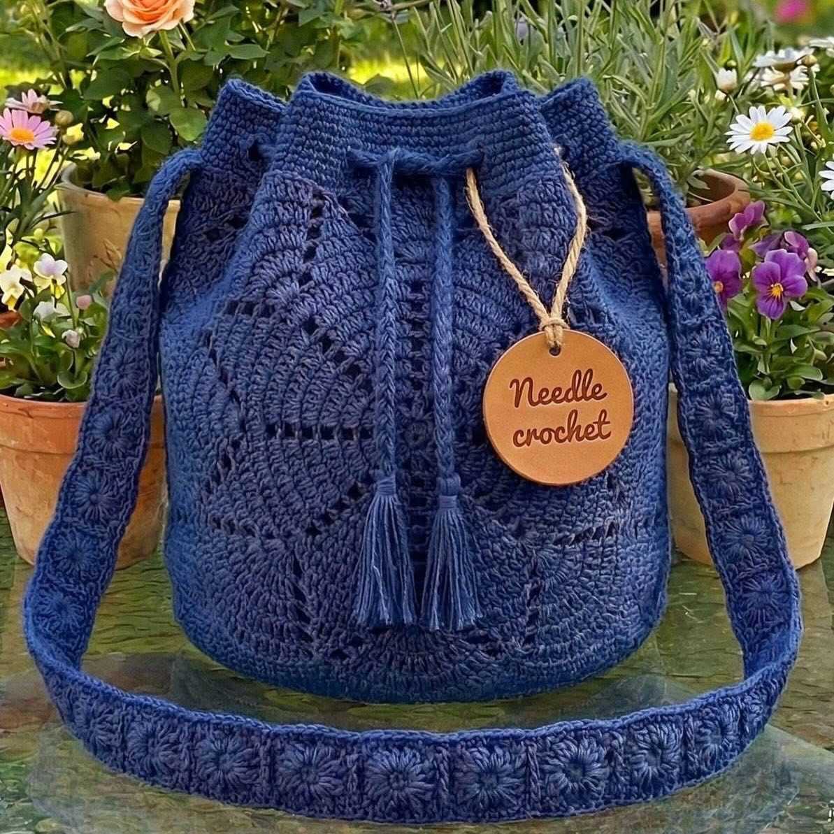 Elegant Crochet Bag Design with Floral Patterns and Tassels