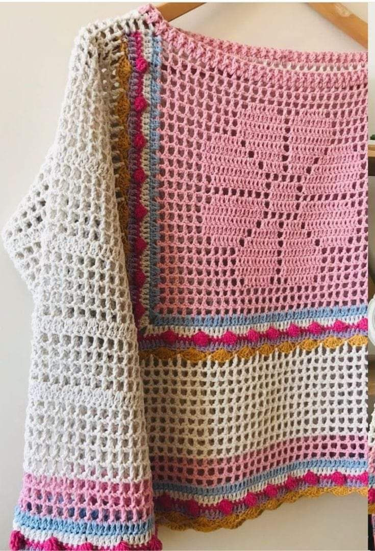 Elegant Crochet Cardigan with Ruffled Edges and Bow Detail