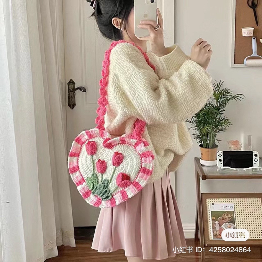 Heart-Shaped Crochet Bag with Pink Floral Design Pattern