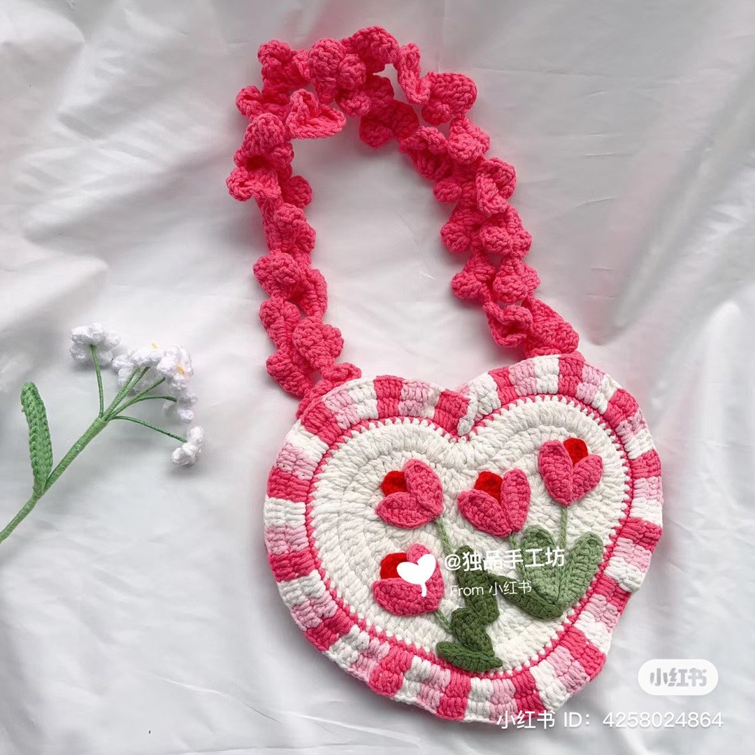 Heart-Shaped Crochet Bag with Pink Floral Design Pattern