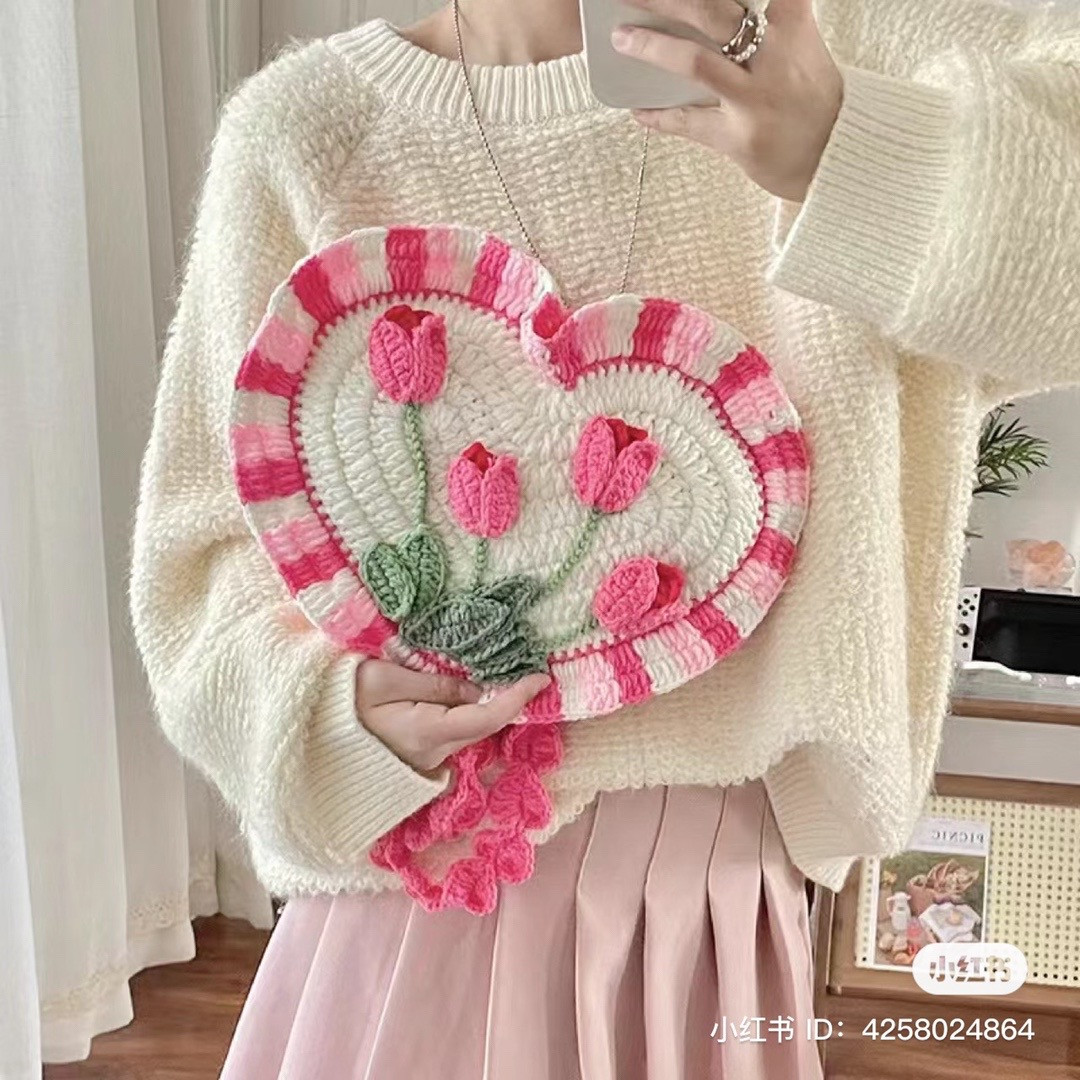 Heart-Shaped Crochet Bag with Pink Floral Design Pattern