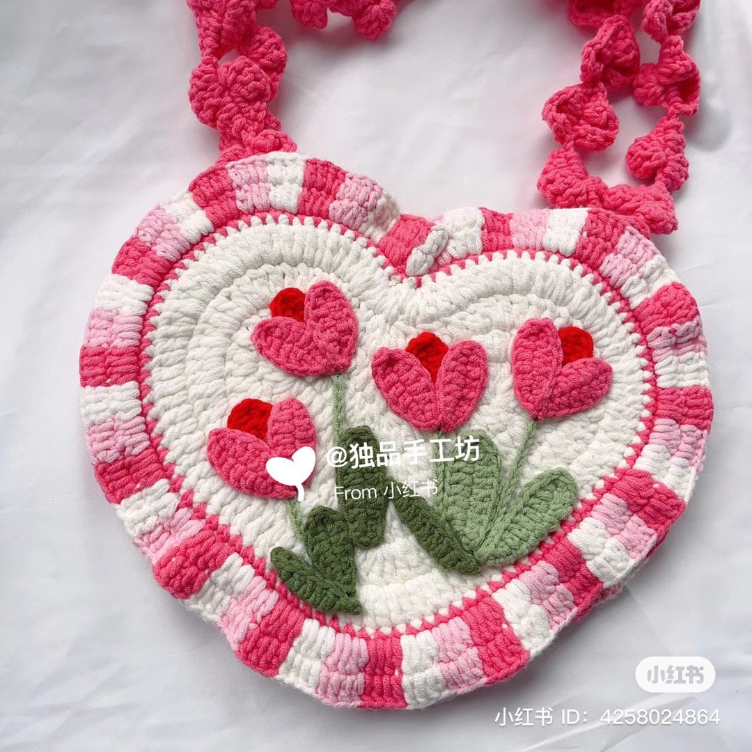 Heart-Shaped Crochet Bag with Pink Floral Design Pattern