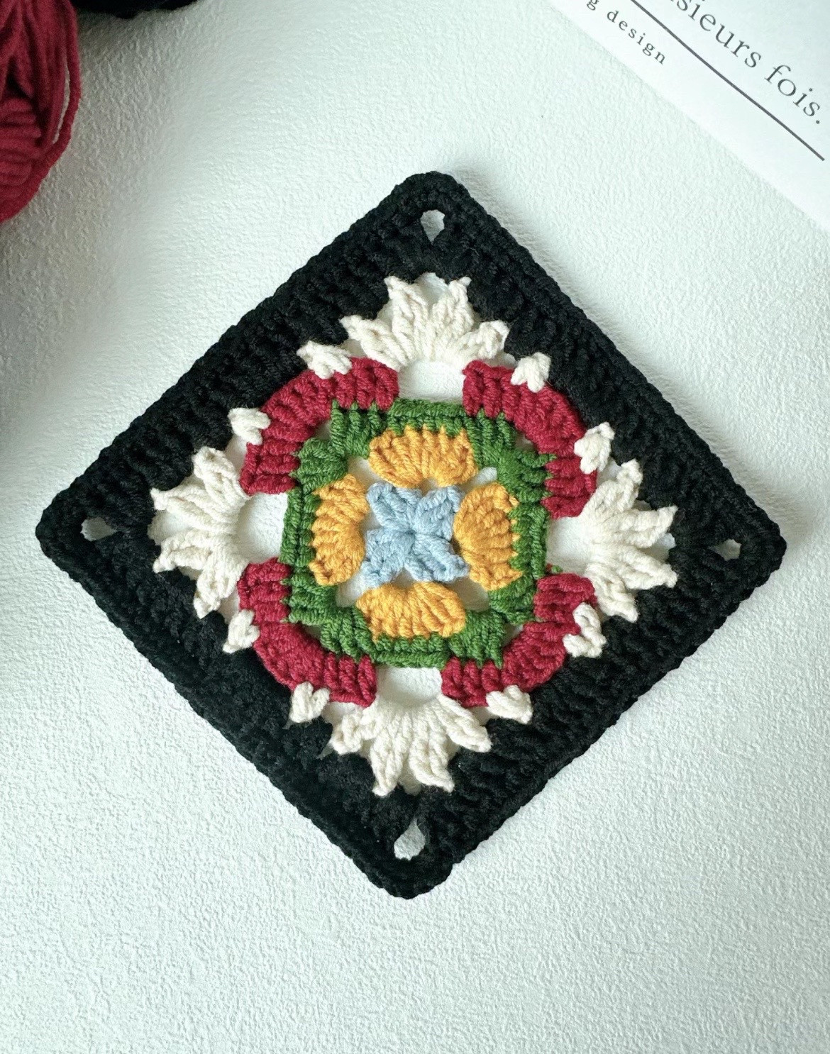 Colorful Crochet Granny Square with Yarn Selection