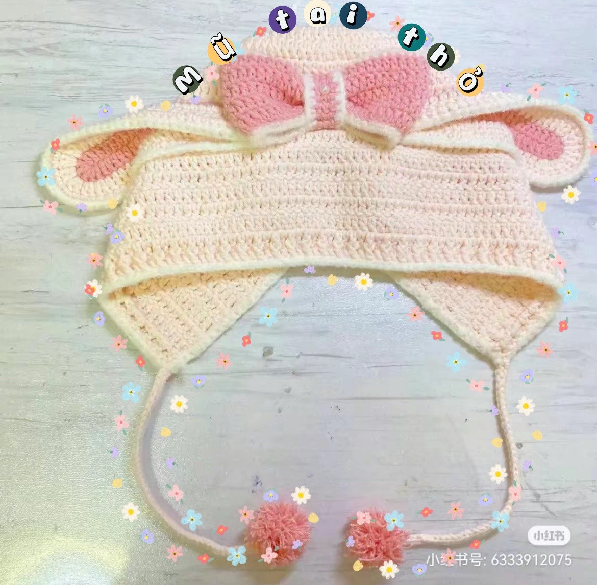 Crochet Baby Hat with Pink Bow and Pom-Pom Tail