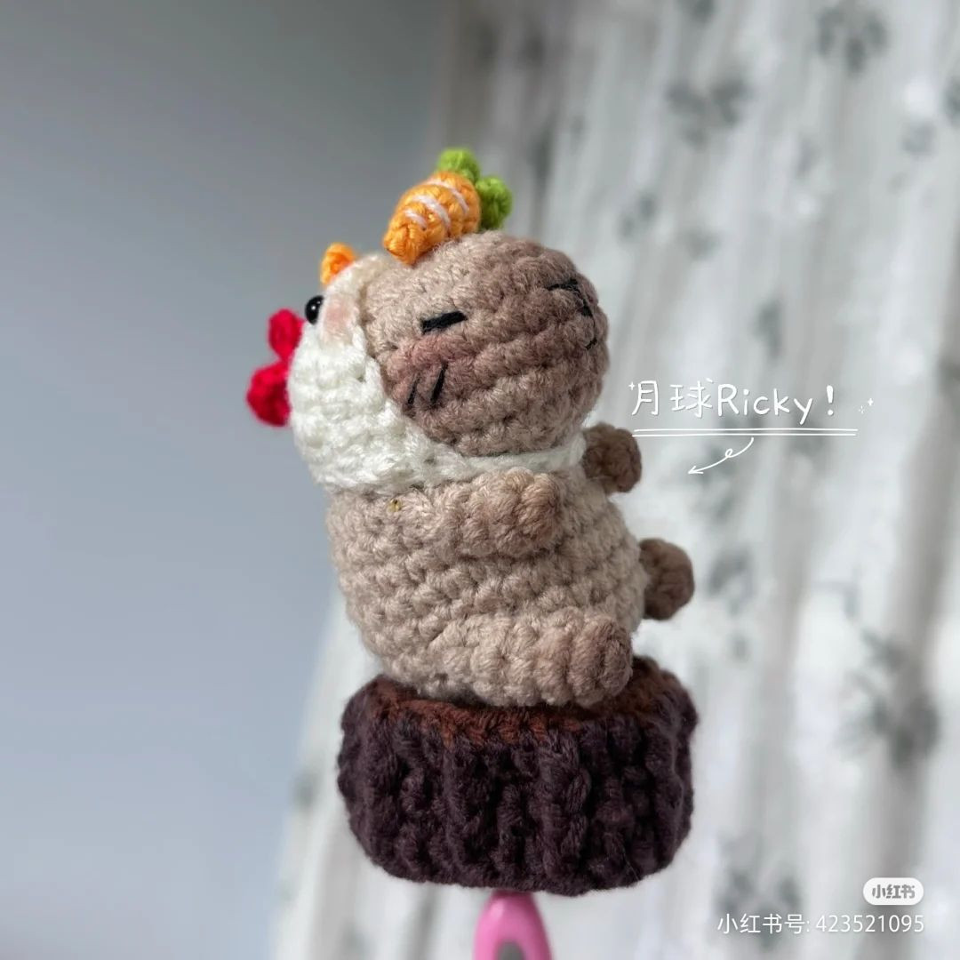 Crochet Cat Wearing Chicken Costume on Wooden Base