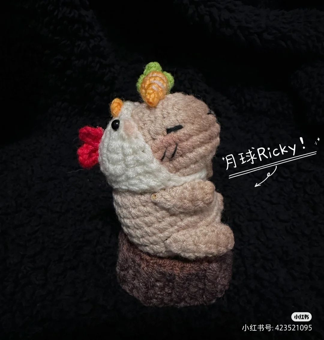 Crochet Cat Wearing Chicken Costume on Wooden Base