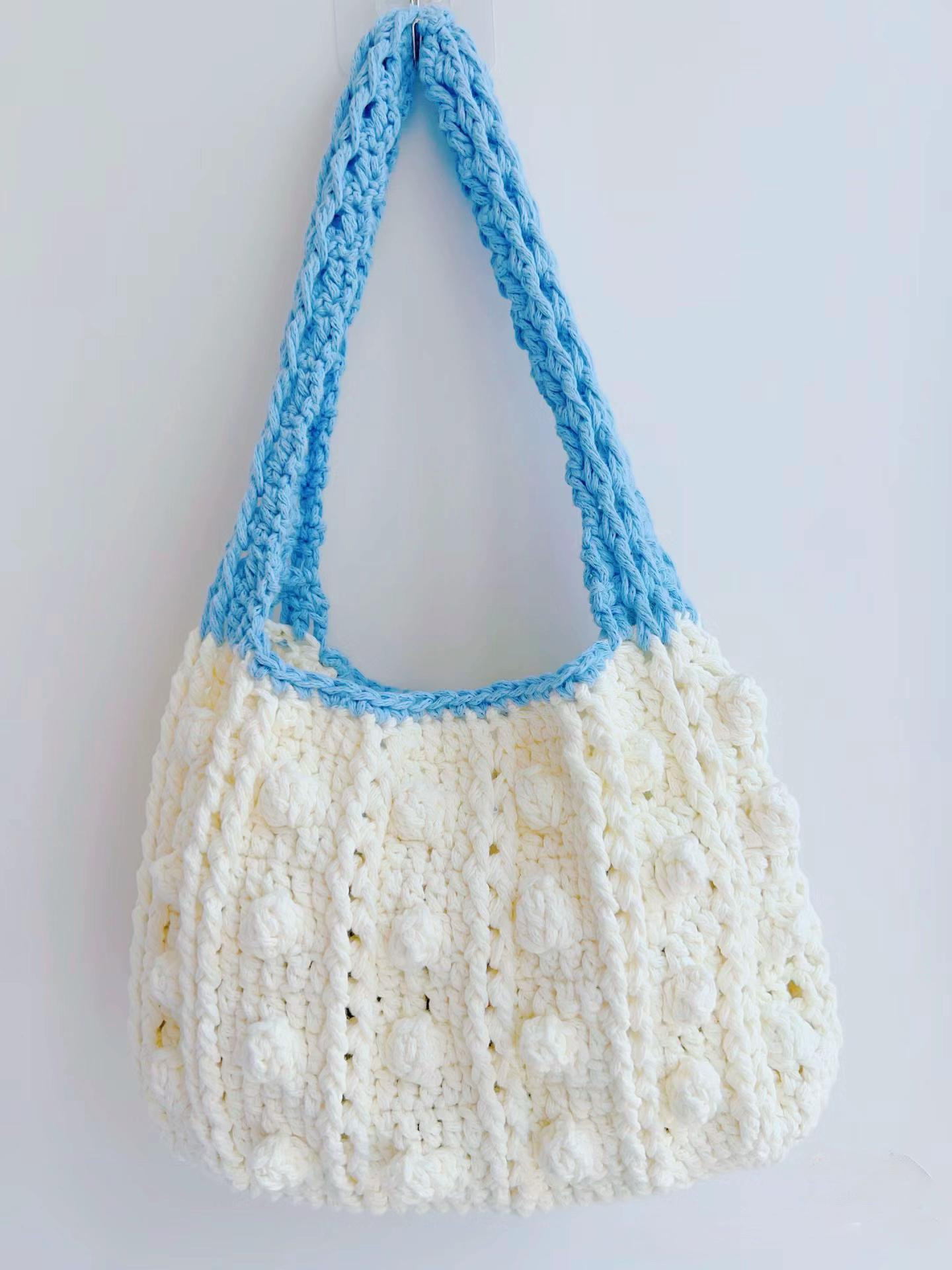 Elegant Crochet Handbag with Pink and White Patterns