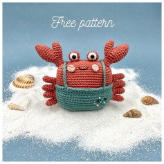 Crab crochet pattern wearing overalls.