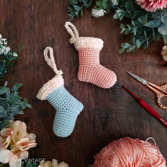 Crochet pattern of socks hanging on the Christmas tree