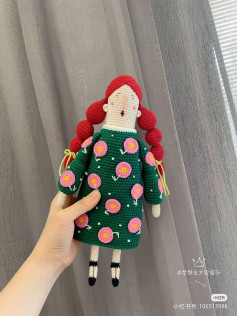 Crochet pattern red hair doll wearing green shirt
