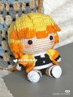 Doll crochet pattern, blonde hair, yellow shirt.