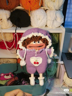 Doll shaped crochet phone bag