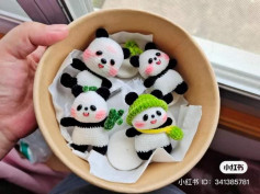 Panda crochet pattern holding food