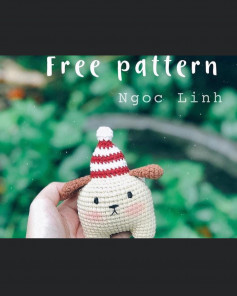 Pattern of crochet dog with birthday hat.