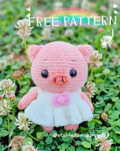 Pink pig crochet pattern wearing a white dress