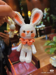 Rabbit crochet pattern with long ears and scarf at the neck