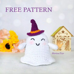 The ghost crochet pattern wearing a purple hat