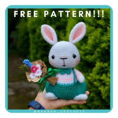 White rabbit crochet pattern wearing blue overalls