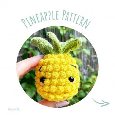 Yellow pineapple crochet pattern, green leaves