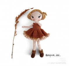 blonde doll wearing brown dress crochet pattern
