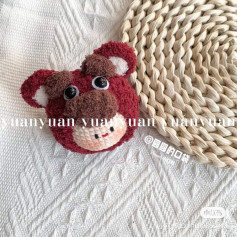 crochet pattern baby wearing a bear hat.