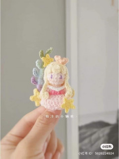 crochet pattern blonde doll wearing pink dress.