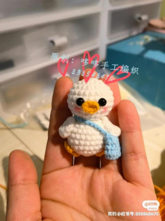 crochet pattern duck with blue crossbody bag.