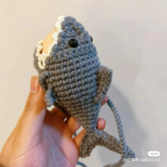 crochet pattern gray shark, white teeth.