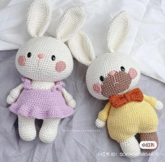 crochet pattern long-eared rabbit, wearing a pink dress, brown muzzle rabbit, wearing a bow.