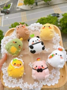 crochet pattern of chicken, pig, rabbit, panda, dinosaur....